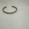 18k-White-Gold-Cartier-Cuff-Love-Bracelet-1.webp Bracelet manchette Love Cartier en or blanc 18 carats