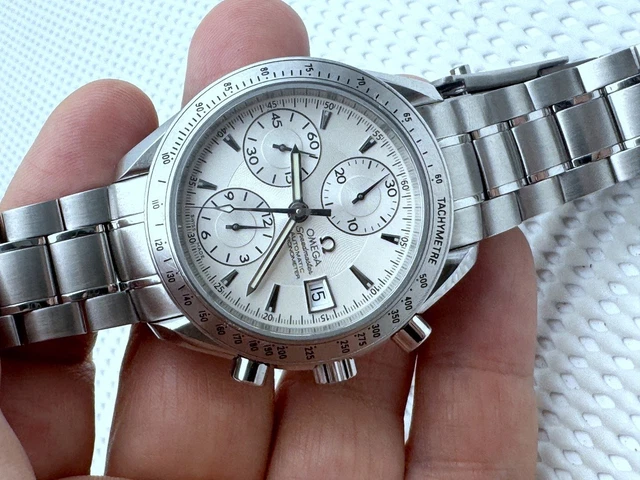 2007-Omega-Speedmaster-40mm-Chronograph-Automatic-1164-Original-17.webp Omega Speedmaster 40 mm Chronographe Automatique 2007 1164 Cadran d'origine Réf. 3211.30