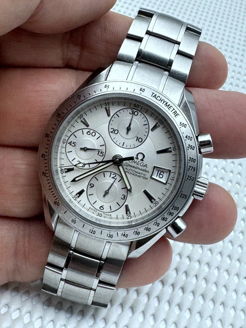 2007-Omega-Speedmaster-40mm-Chronograph-Automatic-1164-Original-21.webp Omega Speedmaster 40 mm Chronographe Automatique 2007 1164 Cadran d'origine Réf. 3211.30