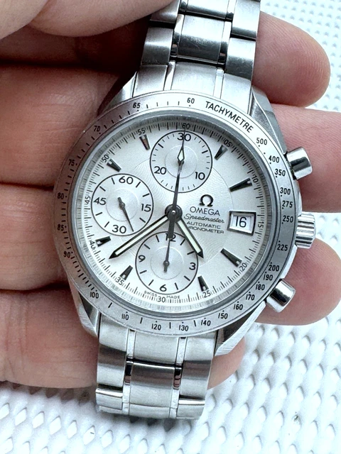 2007-Omega-Speedmaster-40mm-Chronograph-Automatic-1164-Original-5.webp Omega Speedmaster 40 mm Chronographe Automatique 2007 1164 Cadran d'origine Réf. 3211.30