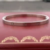 Cartier-18K-White-Gold-Small-Love-Bracelet-Size-46-Copie.webp Bracelet Cartier Love en or blanc 18 carats (taille 15)