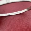 Cartier-18K-White-Gold-Small-Love-Bracelet-Size-61.webp Bracelet Cartier Love en or blanc 18 carats (taille 15)