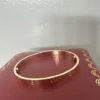 Cartier-Love-Bracelet-Classic-Model-18K-19.webp Bracelet Love Cartier - Modèle Classique - Or rose 18 carats - 21 cm - Coffret et certificat 2022