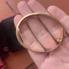 Cartier-Love-Bracelet-Original-Rose-Gold-Size-17-31.webp Bracelet Cartier Love Original en or rose, taille 17, boîte et papiers, 2025