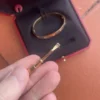 Cartier-Love-Bracelet-Original-Rose-Gold-Size-17-40.webp Bracelet Cartier Love Original en or rose, taille 17, boîte et papiers, 2025