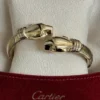 Bracelet Cartier Panthère Cougar Trinity en or jaune, blanc et rose 18 carats, service 2025