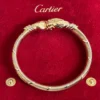 Bracelet Cartier Panthère Cougar Trinity en or jaune, blanc et rose 18 carats, service 2025