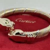 Bracelet Cartier Panthère Cougar Trinity en or jaune, blanc et rose 18 carats, service 2025