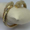 Bracelet Cartier Panthère Cougar Trinity en or jaune, blanc et rose 18 carats, service 2025