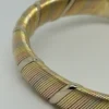 Bracelet Cartier Panthère Cougar Trinity en or jaune, blanc et rose 18 carats, service 2025