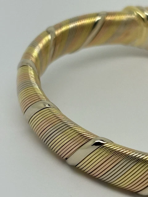 Bracelet Cartier Panthère Cougar Trinity en or jaune, blanc et rose 18 carats, service 2025