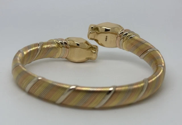 Bracelet Cartier Panthère Cougar Trinity en or jaune, blanc et rose 18 carats, service 2025