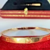 Cartier-Rose-Gold-Love-Bracelet-Medium-Model-With (11) Bracelet Cartier Love en or rose, modèle moyen, avec boîte et documents d'origine.