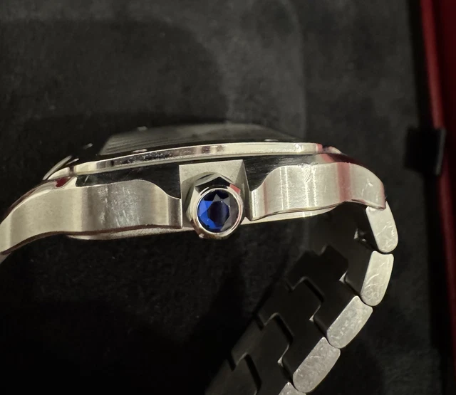 Cartier-Santos-de-Cartier-Medium-Stainless-Steel-WSSA0029-23.webp Montre Cartier Santos de Cartier Medium en acier inoxydable WSSA0029, coffret et papiers