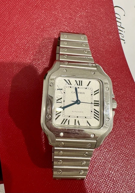 Cartier-Santos-de-Cartier-Medium-Stainless-Steel-WSSA0029-26.webp Montre Cartier Santos de Cartier Medium en acier inoxydable WSSA0029, coffret et papiers