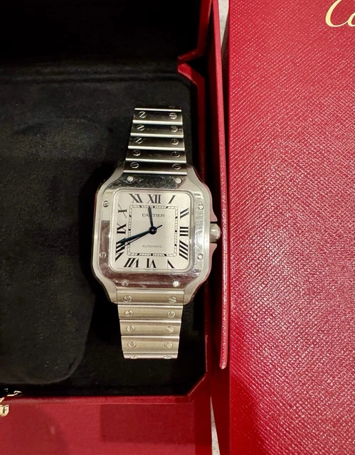 Cartier-Santos-de-Cartier-Medium-Stainless-Steel-WSSA0029-27.webp Montre Cartier Santos de Cartier Medium en acier inoxydable WSSA0029, coffret et papiers