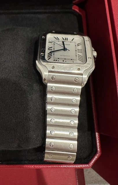 Cartier-Santos-de-Cartier-Medium-Stainless-Steel-WSSA0029-28.webp Montre Cartier Santos de Cartier Medium en acier inoxydable WSSA0029, coffret et papiers
