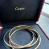 Cartier-Trinity-Tri-Color-Bangle-Bracelet-18k-Gold-Classic-16.webp Bracelet jonc Cartier Trinity Tricolore en or 18 carats, modèle classique