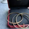 Cartier-Trinity-Tri-Color-Bangle-Bracelet-18k-Gold-Classic-20.webp Bracelet jonc Cartier Trinity Tricolore en or 18 carats, modèle classique