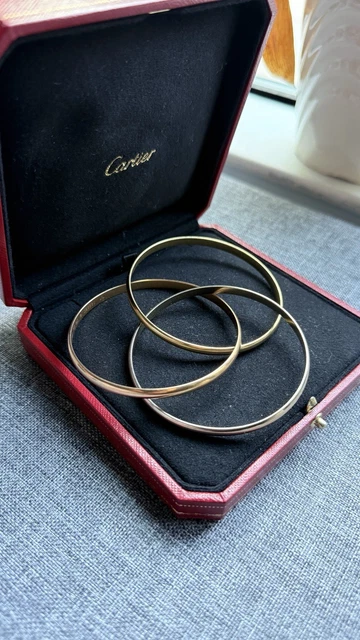 Cartier-Trinity-Tri-Color-Bangle-Bracelet-18k-Gold-Classic-21.webp Bracelet jonc Cartier Trinity Tricolore en or 18 carats, modèle classique