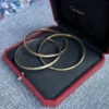 Cartier-Trinity-Tri-Color-Bangle-Bracelet-18k-Gold-Classic-23.webp Bracelet jonc Cartier Trinity Tricolore en or 18 carats, modèle classique