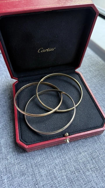 Cartier-Trinity-Tri-Color-Bangle-Bracelet-18k-Gold-Classic-24.webp Bracelet jonc Cartier Trinity Tricolore en or 18 carats, modèle classique