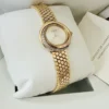 Montre Cartier Trinity pour femme, or jaune 18 carats et diamants ~ Boîte et papiers