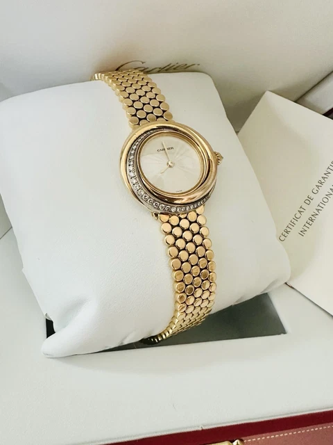 Montre Cartier Trinity pour femme, or jaune 18 carats et diamants ~ Boîte et papiers
