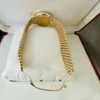 Montre Cartier Trinity pour femme, or jaune 18 carats et diamants ~ Boîte et papiers