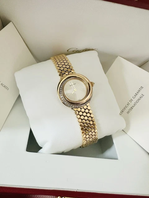 Montre Cartier Trinity pour femme, or jaune 18 carats et diamants ~ Boîte et papiers