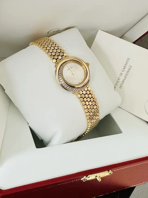 Montre Cartier Trinity pour femme, or jaune 18 carats et diamants ~ Boîte et papiers