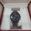 Chronographe automatique Omega Speedmaster HB-SIA GMT d'occasion. Bon état.