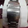 Chronographe automatique Omega Speedmaster HB-SIA GMT d'occasion. Bon état.