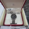 Chronographe automatique Omega Speedmaster HB-SIA GMT d'occasion. Bon état.