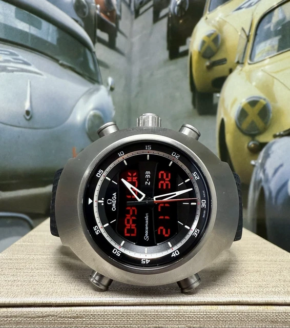 Omega-Speedmaster-Spacemaster-Z-33-Titanium-Quartz-Watch-Full-1.webp Montre à quartz Omega Speedmaster Spacemaster Z-33 en titane - Coffret complet et papiers