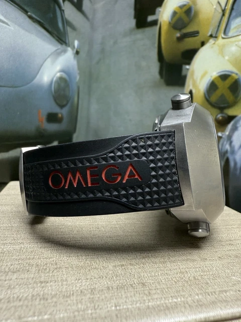 Omega-Speedmaster-Spacemaster-Z-33-Titanium-Quartz-Watch-Full-10.webp Montre à quartz Omega Speedmaster Spacemaster Z-33 en titane - Coffret complet et papiers