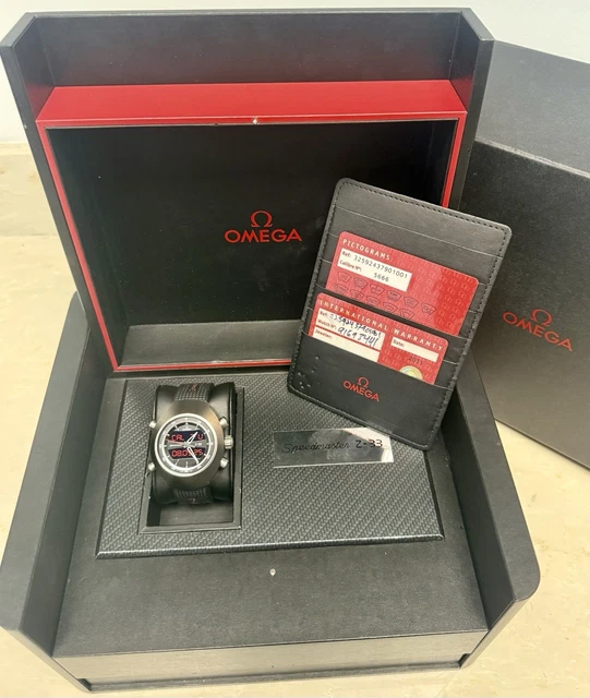 Omega-Speedmaster-Spacemaster-Z-33-Titanium-Quartz-Watch-Full-13.webp Montre à quartz Omega Speedmaster Spacemaster Z-33 en titane - Coffret complet et papiers