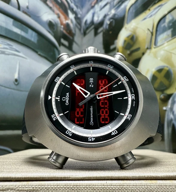 Omega-Speedmaster-Spacemaster-Z-33-Titanium-Quartz-Watch-Full-3.webp Montre à quartz Omega Speedmaster Spacemaster Z-33 en titane - Coffret complet et papiers