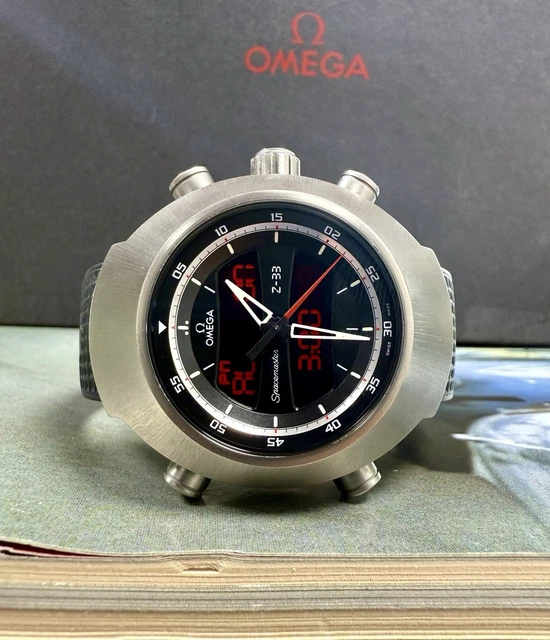 Omega-Speedmaster-Spacemaster-Z-33-Titanium-Quartz-Watch-Full-7.webp Montre à quartz Omega Speedmaster Spacemaster Z-33 en titane - Coffret complet et papiers