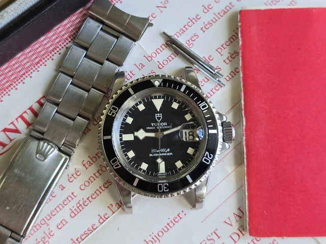 Tudor-Rolex-Submariner-9411-Vintage-Snowflake-Diver-Full-24.webp Tudor Rolex Submariner 9411 Vintage Snowflake Diver, coffret complet, papiers, 1976