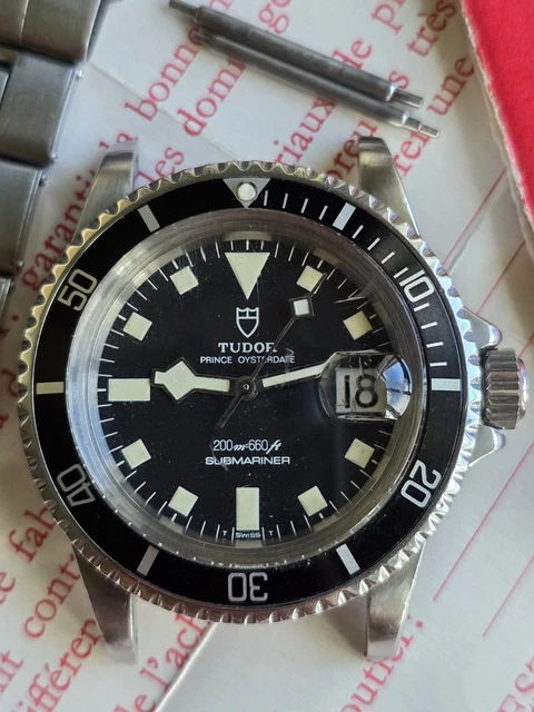 Tudor-Rolex-Submariner-9411-Vintage-Snowflake-Diver-Full-38.webp Tudor Rolex Submariner 9411 Vintage Snowflake Diver, coffret complet, papiers, 1976