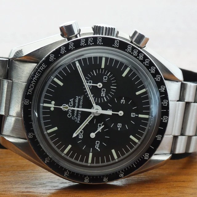 Montre Omega Speedmaster vintage 145.022 - 1983 avec documents de service et extrait d'archives
