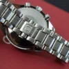 omega-speedmaster-triple-date-35238000-papers-generic-box-14.webp Omega Speedmaster Triple Date 3523.80.00, papiers, boîte générique, 1 an, GTE, 2003