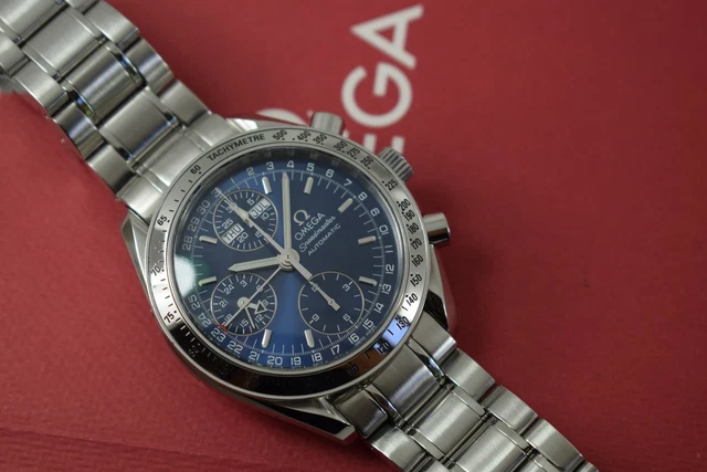 omega-speedmaster-triple-date-35238000-papers-generic-box-17.webp Omega Speedmaster Triple Date 3523.80.00, papiers, boîte générique, 1 an, GTE, 2003