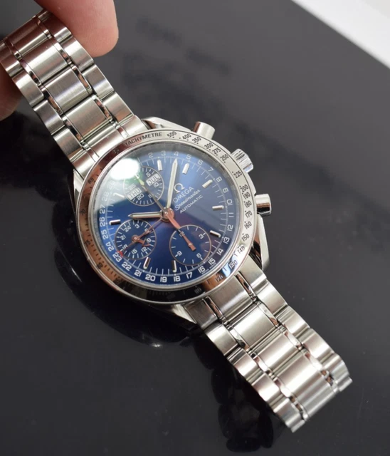 omega-speedmaster-triple-date-35238000-papers-generic-box-19.webp Omega Speedmaster Triple Date 3523.80.00, papiers, boîte générique, 1 an, GTE, 2003