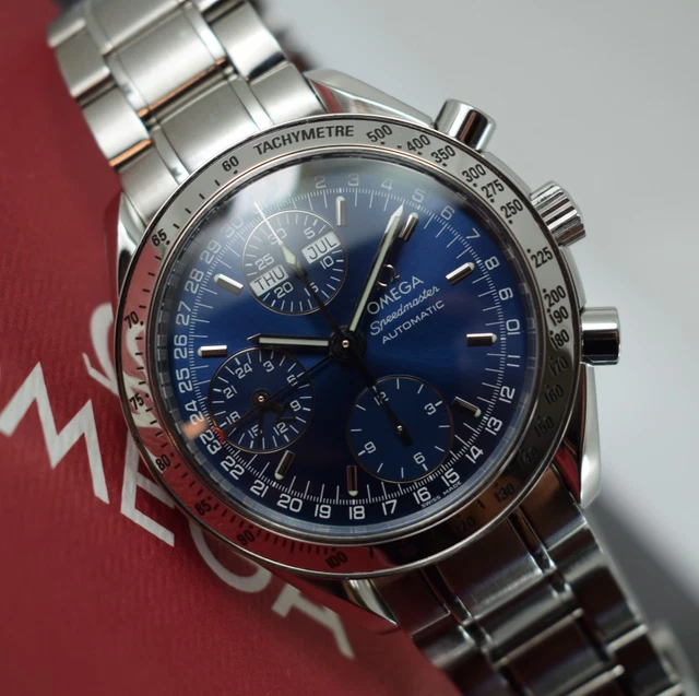 omega-speedmaster-triple-date-35238000-papers-generic-box.webp Omega Speedmaster Triple Date 3523.80.00, papiers, boîte générique, 1 an, GTE, 2003